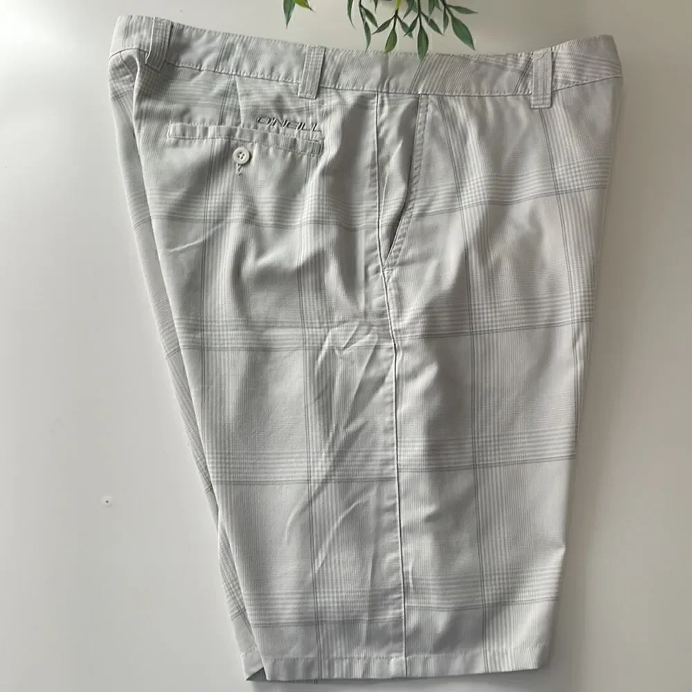 O’Neill golf shorts.  Size 36 waist.  Grey and white plaid.